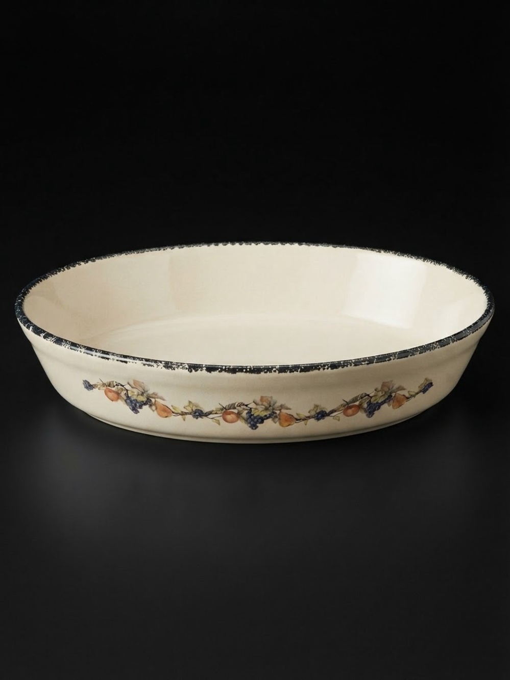 Vintage stoneware oval baker dish from the brand Home & Garden Party